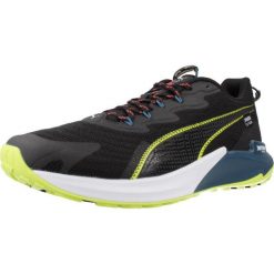 Tenisówki Puma Model Fast- Trac Nitro 2 Kolor Czarny. Czarne trampki i tenisówki męskie Puma, bez wzorów, z materiału, bez zapięcia. Za 519.00 zł.