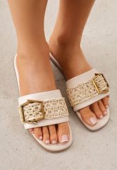 Beżowe Klapki w Stylu Boho z Plecionką z Rafii i Metalową Klamerką Mezelin. Brązowe klapki damskie Renee, bez wzorów, z jeansu, bez obcasa, na płaskiej podeszwie. Za 79.99 zł.