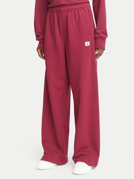 Calvin Klein Jeans Spodnie dresowe LV047C249G Czerwony ciemny Regular Fit. Czerwone jeansy damskie Calvin Klein Jeans. Za 369.99 zł.