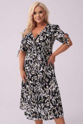 Elegancka sukienka Elise na wesele w czarno-białe wzory PLUS SIZE OVERSIZE XXL. Białe sukienki damskie Moda Size Plus Iwanek, na co dzień, plus size, bez wzorów, z materiału, eleganckie, bez kołnierzyka, plus size, bez ramiączek, midi, oversize. Za 389.90 zł.