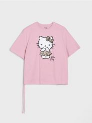 Bawełniana koszulka z nadrukiem Hello Kitty - różowy. Czerwone koszulki dziewczęce Sinsay, l, bez wzorów, z bawełny, bez ramiączek. Za 19.99 zł.