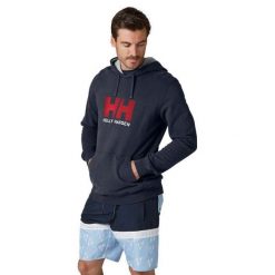 Bluza sportowa męska Helly Hansen Logo Hoodie. Niebieskie bluzy sportowe męskie Helly Hansen, bez wzorów, sportowe, bez kołnierzyka, bez ramiączek. Za 365.30 zł.