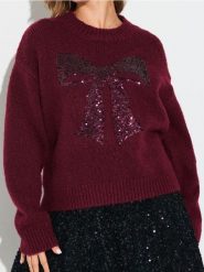 Sweter z cekinową aplikacją w kształcie kokardy i domieszką wełny - różowy. Czerwone swetry klasyczne damskie Sinsay, l, z wełny, bez kołnierzyka. Za 69.99 zł.