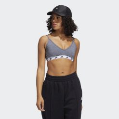 Biustonosz damski adidas Purebare Light Support. Czarne biustonosze sportowe damskie Adidas, bez wzorów, z materiału. Za 167.85 zł.