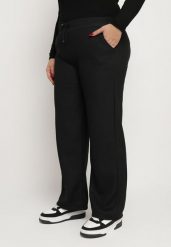 Czarne Ocieplane Spodnie Dresowe z Szeroką Nogawką i Wysokim Stanem Sevissa. Czarne spodnie dresowe damskie Born2be, plus size, bez wzorów, z dresówki. Za 24.99 zł.