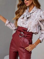 Milan Kiss Bluzka w kolorze kremowym rozmiar: S. Brązowe bluzki damskie Milan Kiss, s, bez wzorów, bez kołnierzyka, bez ramiączek. Za 113.99 zł.