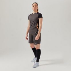 Spodenki do piłki nożnej damskie Kipsta. Niebieskie szorty damskie KIPSTA, bez wzorów, z materiału, sportowe. W wyprzedaży za 44.99 zł.