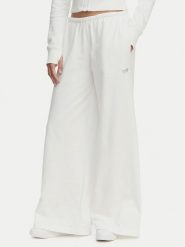 Tommy Jeans Spodnie dresowe Metallic Logo DW0DW22735 Biały Wide Leg. Białe jeansy damskie Tommy Jeans, xxs, bez wzorów, z bawełny. Za 409.99 zł.