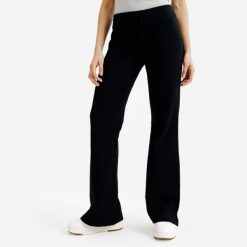 Rozszerzane legginsy damskie Elementals. Czarne legginsy damskie Decathlon, s, bez wzorów, z bawełny. Za 89.99 zł.