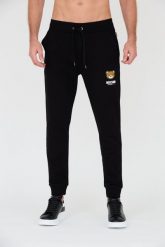 MOSCHINO Czarne spodnie dresowe. Czarne spodnie dresowe męskie MOSCHINO, bez wzorów, z dresówki. W wyprzedaży za 599.99 zł.