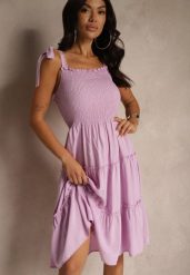 Fioletowa Sukienka z Wiskozą o Rozkloszowanym Kroju na Ramiączkach z Wiązaniem Aranive. Fioletowe sukienki damskie Renee, na co dzień, m, bez wzorów, z wiskozy, eleganckie, bez kołnierzyka, bez ramiączek, midi, proste. W wyprzedaży za 52.49 zł.
