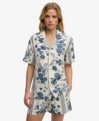 Superdry Koszula krótki rękaw Beach w kwiaty Jeane Floral Cream. Białe koszule damskie Superdry., na lato, bez wzorów, z bawełny, bez kołnierzyka, bez ramiączek. Za 234.25 zł.