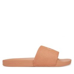 Klapki Calvin Klein Jeans. Pomarańczowe klapki damskie Calvin Klein Jeans, bez wzorów, z jeansu, bez obcasa. Za 129.99 zł.