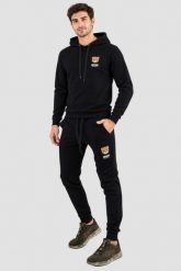 MOSCHINO Czarne męskie spodnie dresowe Home Pants, Rozmiar L. Czarne spodnie dresowe męskie MOSCHINO, bez wzorów, z dresówki. W wyprzedaży za 599.99 zł.