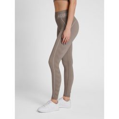 Damskie legginsy ze średnim stanem Hummel TE Christel. Szare legginsy damskie HUMMEL, l, bez wzorów, z dzianiny, na fitness i siłownię. Za 156.00 zł.