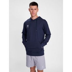 Bluza z kapturem Hummel Go 2.0. Niebieskie bluzy sportowe damskie HUMMEL, bez wzorów, bez ramiączek, z kapturem. Za 233.50 zł.