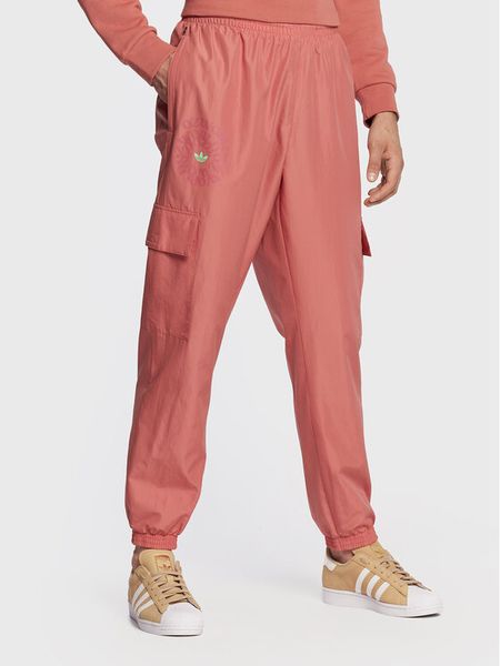 Adidas Spodnie dresowe Ozworld HL9254 Pomarańczowy Regular Fit. Brązowe spodnie dresowe męskie Adidas, bez wzorów, z dresówki. Za 209.99 zł.