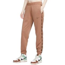 Spodnie Do Biegania Z Taśmą Dla Kobiet. Brązowe spodnie dresowe damskie Nike, m, bez wzorów. Za 236.99 zł.