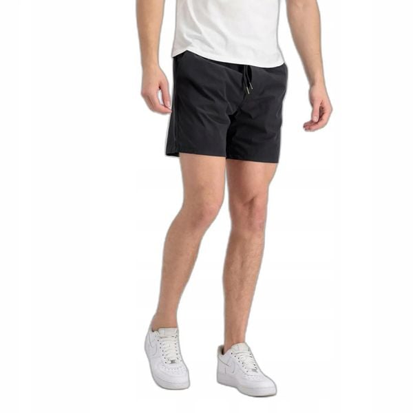 MĘSKIE SPODENKI SPORTOWE ALPHA NYLON JOGGER SHORT PRZED KOLANO CZARNE. Czarne szorty męskie Alpha Industries, l, z bawełny, do biegania. Za 269.00 zł.