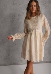 Beżowa Rustykalna Sukienka z Bawełną Zdobiona Haftem i Ażurowymi Wycięciami Winlith. Brązowe sukienki damskie Renee, l, z aplikacjami, z bawełny, klasyczne, bez kołnierzyka, bez ramiączek, mini. Za 129.99 zł.