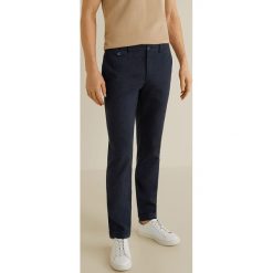 Mango Man - Spodnie Starfish. Niebieskie spodnie materiałowe męskie Mango Man, bez wzorów, z bawełny, casualowe. W wyprzedaży za 59.90 zł.
