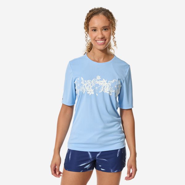 Top UV surfingowy damski Decathlon Malou Aloha krótki rękaw. Niebieskie topy sportowe damskie Decathlon, na lato, m, bez wzorów, z dzianiny, bez ramiączek. Za 49.99 zł.