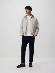 Jeansy chino slim fit - granatowy. Niebieskie jeansy męskie Reserved. Za 159.99 zł.