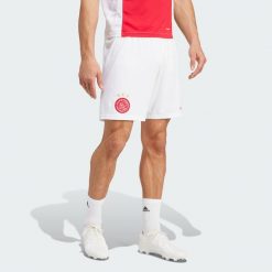 Szorty Ajax Amsterdam 24/25 Home. Białe szorty męskie Adidas, bez wzorów, z materiału, sportowe. Za 199.00 zł.