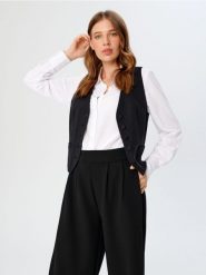 Spodnie wide leg - czarny. Czarne spodnie materiałowe damskie Sinsay, bez wzorów, z włókna. Za 69.99 zł.