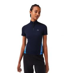Koszulka damska Lacoste Contrast Bands Zip Neck Polo. Niebieskie bluzki sportowe damskie Lacoste, m, z dresówki, bez kołnierzyka, bez ramiączek. Za 357.00 zł.