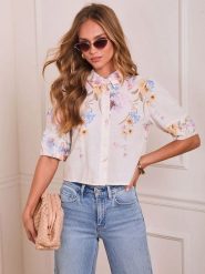 Milan Kiss Bluzka w kolorze kremowym rozmiar: L. Brązowe bluzki damskie Milan Kiss, l, bez wzorów, bez kołnierzyka, bez ramiączek. Za 130.99 zł.