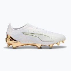 Buty piłkarskie PUMA Ultra 6 Ultimate FG puma white/metallic gold/puma black. Białe buty sportowe na co dzień damskie Puma, z materiału, bez zapięcia, do biegania. Za 689.99 zł.