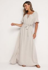 Jasnobeżowa Trapezowa Muślinowa Sukienka z Bawełny z Paskiem i Gumką w Talii Vimarinn. Brązowe sukienki damskie Born2be, na co dzień, bez wzorów, z bawełny, bez kołnierzyka, bez ramiączek, maxi, proste. Za 149.99 zł.