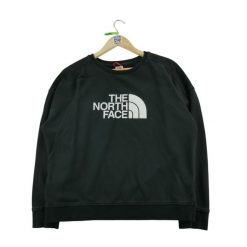 Bluza damska The North Face czarna. Czarne bluzy sportowe damskie The North Face, l, bez wzorów, z materiału, bez ramiączek, bez kaptura. Za 102.20 zł.