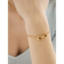 Bransoletka Guess. Żółte bransoletki damskie Guess, złote. Za 199.99 zł.