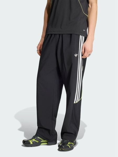 Adidas Spodnie dresowe Care Bears KR1480 Czarny Oversize. Czarne spodnie dresowe męskie Adidas, bez wzorów, z bawełny. Za 180.99 zł.