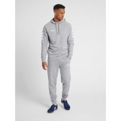 Bluza sportowa z kapturem męska Hummel Go Cotton Hoodie. Szare bluzy sportowe męskie HUMMEL, bez wzorów, sportowe, bez kołnierzyka, bez ramiączek. Za 168.00 zł.