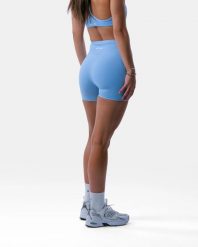 Damskie szorty z wysokim stanem i kieszenią fitness – Encore – błękitny. Niebieskie spodenki sportowe damskie AESTHETICWOLF, bez wzorów, z dzianiny, z podwyższonym stanem. Za 189.99 zł.