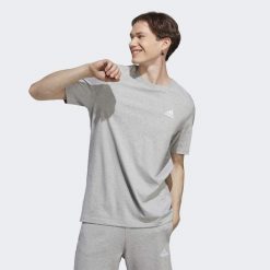 Koszulka sportowa męska adidas Essentials. Żółte t-shirty sportowe męskie Adidas, m, bez ramiączek, do piłki nożnej. Za 96.00 zł.