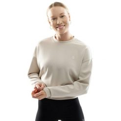 Bluza treningowa crop top dla kobiet Fitness Siroko Ignite. Brązowe bluzy sportowe damskie SIROKO, l, bez wzorów, z materiału, bez ramiączek, krótkie, bez kaptura. Za 148.00 zł.