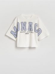 Krótki t-shirt z napisem - złamana biel. Koszulki dziewczęce Reserved, bez wzorów, z bawełny, bez ramiączek. Za 45.99 zł.