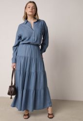 Niebieska Rozkloszowana Spódnica z Lyocellu z Wysokim Stanem i Falbanami Emorithia. Niebieskie spódniczki damskie Born2be, bez wzorów, z lyocellu, klasyczne, z podwyższonym stanem, maxi, koszulowe. Za 89.99 zł.