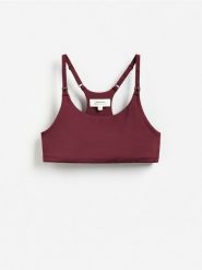Sportowy top - bordowy. Czerwone topy sportowe damskie Reserved, l, bez wzorów, z dzianiny, bez ramiączek. Za 79.99 zł.