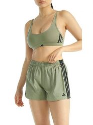 Adidas Szorty w kolorze zielonym rozmiar: M. Zielone szorty damskie Adidas, bez wzorów, z bawełny. Za 69.75 zł.