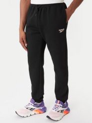 Reebok Spodnie dresowe Winchester Pant RK25146CCM Czarny Regular Fit. Czarne spodnie dresowe męskie Reebok, bez wzorów, z bawełny. Za 199.99 zł.