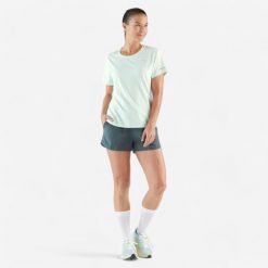 Koszulka do biegania damska Kiprun Run 500 Dry. Fioletowe t-shirty damskie KIPRUN, m, bez wzorów, z elastanu, bez kołnierzyka. Za 59.99 zł.