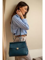 Victor & Hugo Paris Skórzana torebka "Matti" w kolorze granatowym - 22 x 25 x 14 cm rozmiar: onesize. Niebieskie torebki klasyczne damskie Victor & Hugo Paris, bez wzorów, z materiału, bez dodatków. Za 295.99 zł.