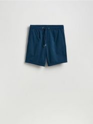 Szorty regular fit - granatowy. Niebieskie szorty męskie Reserved, bez wzorów, z dzianiny. Za 99.99 zł.