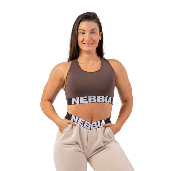 Biustonosz fitness NEBBIA Medium Impact Cross. Brązowe biustonosze sportowe damskie Nebbia, bez wzorów, z elastanu. Za 52.99 zł.