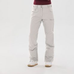 Spodnie snowboardowe damskie Dreamscape SNB 500. Brązowe spodnie dresowe damskie DREAMSCAPE, bez wzorów, z materiału, sportowe. Za 379.99 zł.